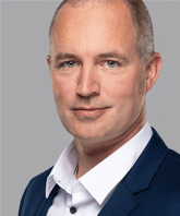 Dominic-Rösti_Head-of-DevOps_grey